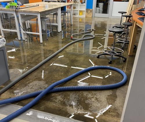 vacuums remove water from the studio